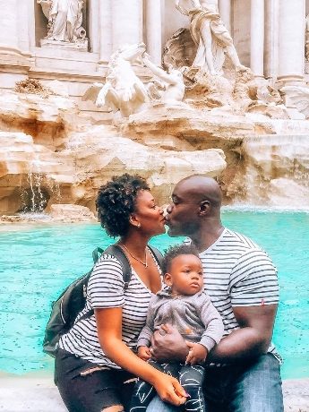 Family at Trevi Fountain with toddler