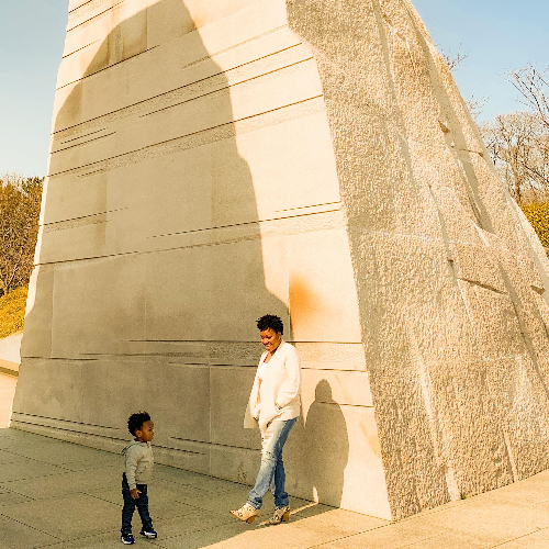 Mother and toddler at the Martin Luther King, Jr. memorial in Washington, DC.